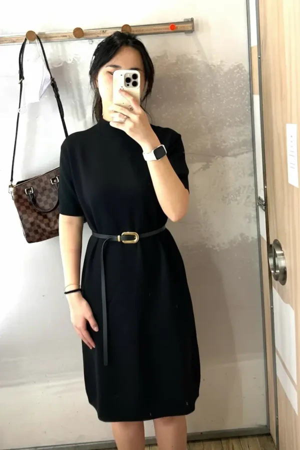 The generated try-on image, showing the original shopper in the black dress.